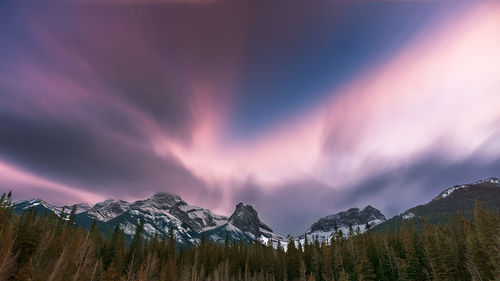 Panoramic view of mountains against sky during winter