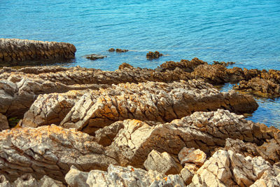 Ocean coast rock formation . rocky coast and blue water