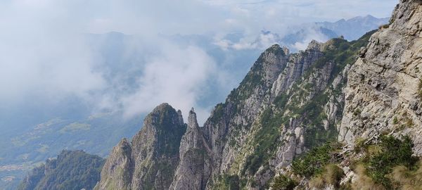 Panoramic view of rocky mountains against sky