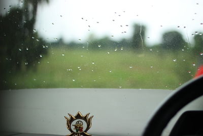 Close-up of water drops on glass