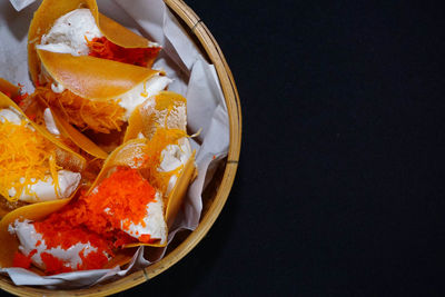 High angle view of fruits in plate on table