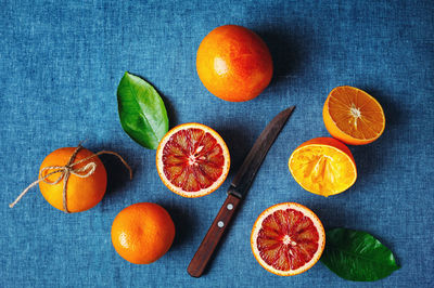 High angle view of orange fruits on table