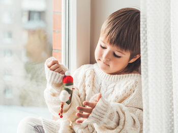 Portrait of cute boy looking at camera