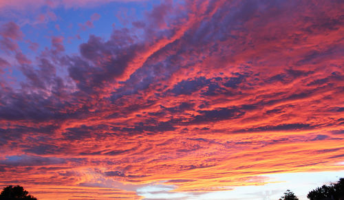 Scenic view of dramatic sky over sea