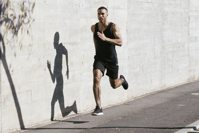 Full length of young man running