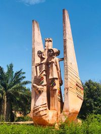 View of statue against blue sky