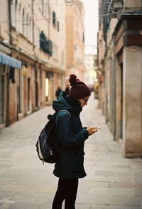 Young woman on street in city
