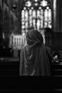 Rear view of woman standing