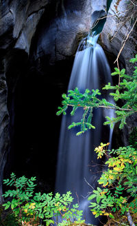 Scenic view of waterfall in cave