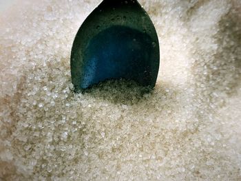 High angle view of blue water on white surface