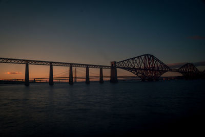 View of suspension bridge at night