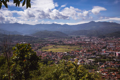 Aerial view of townscape against sky