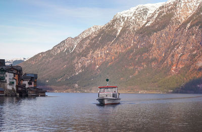 Scenic view of sea against mountains