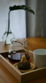 Close-up of tea cup on table