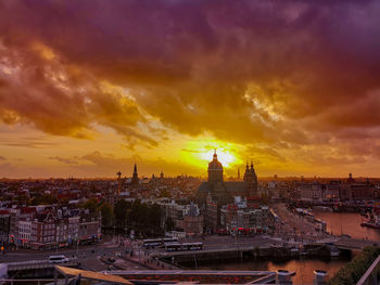Cityscape against sky during sunset