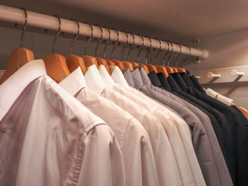 Clothes hanging in rack