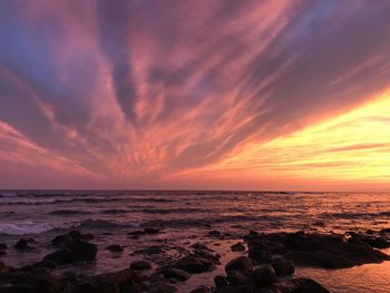 Scenic view of sea against sky during sunset