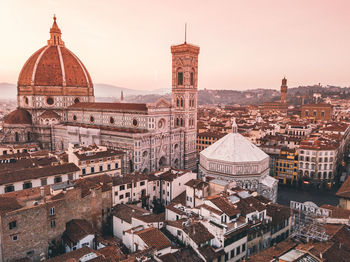 Aerial view of city buildings against sky