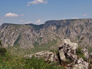 Scenic view of rocky mountains against sky