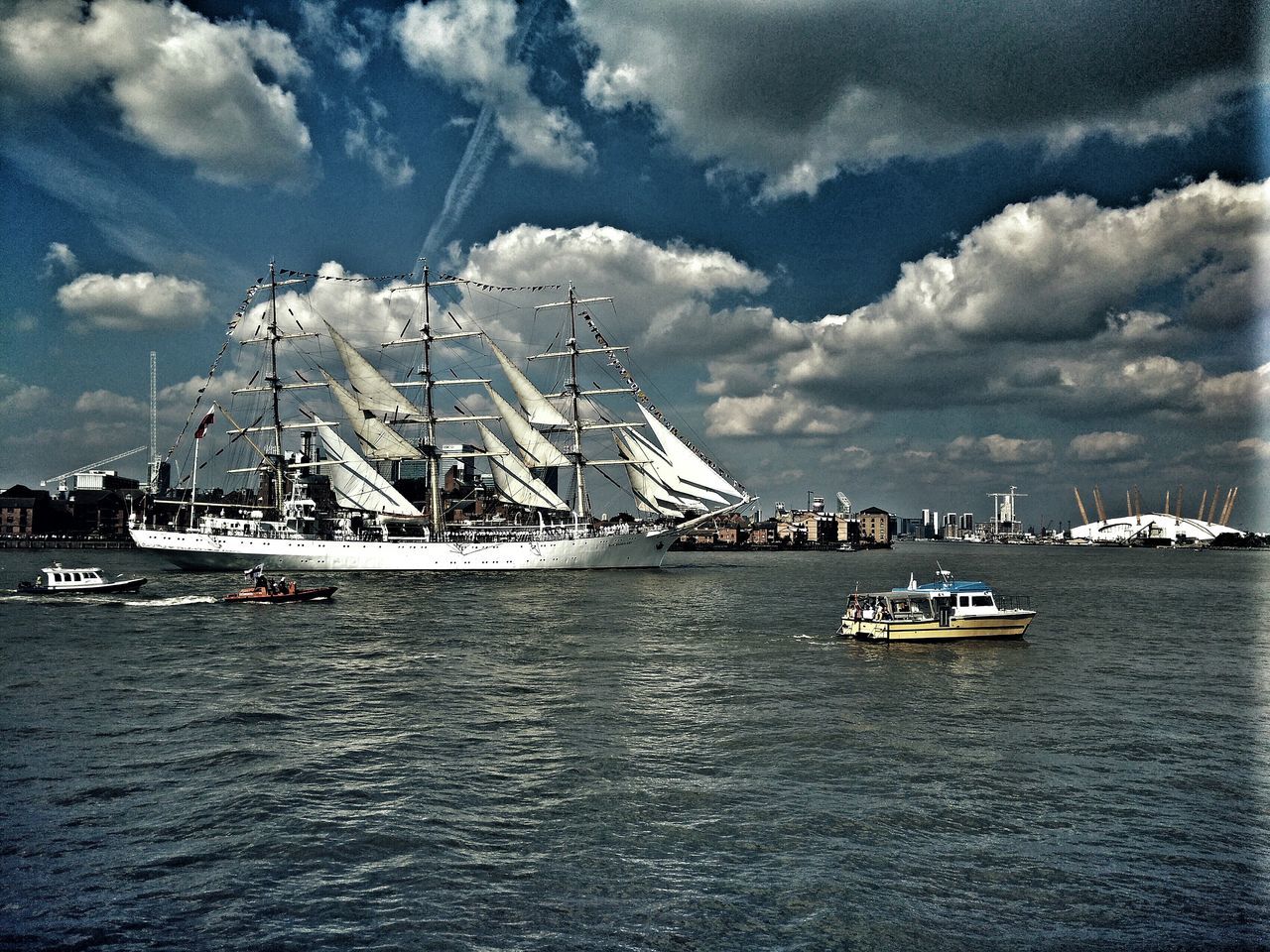 nautical vessel, transportation, mode of transport, boat, water, sky, moored, waterfront, cloud - sky, sea, mast, sailing, cloudy, nature, travel, sailboat, cloud, tranquility, day, rippled