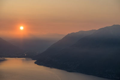 Scenic view of mountains against sky during sunset