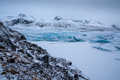 Panoramic image of the snow-coverd glacier svinafellsjoekull on a winter day, iceland, europe