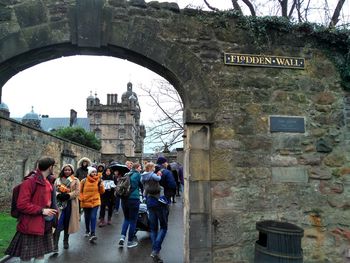 Group of people in front of historical building