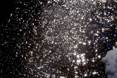 Low angle view of illuminated lights