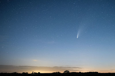 Scenic view of star field against sky at night
