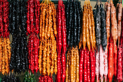 Close-up of multi colored candies for sale at market stall