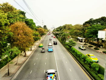 Cars on road in city