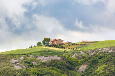 Farm on a field at a deep ravine