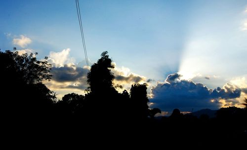 Scenic view of landscape against cloudy sky