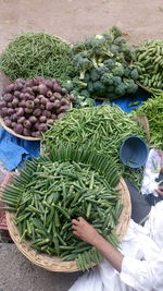 Low section of vendor selling vegetables