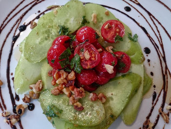 High angle view of strawberries in plate