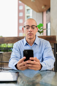 Young man using mobile phone
