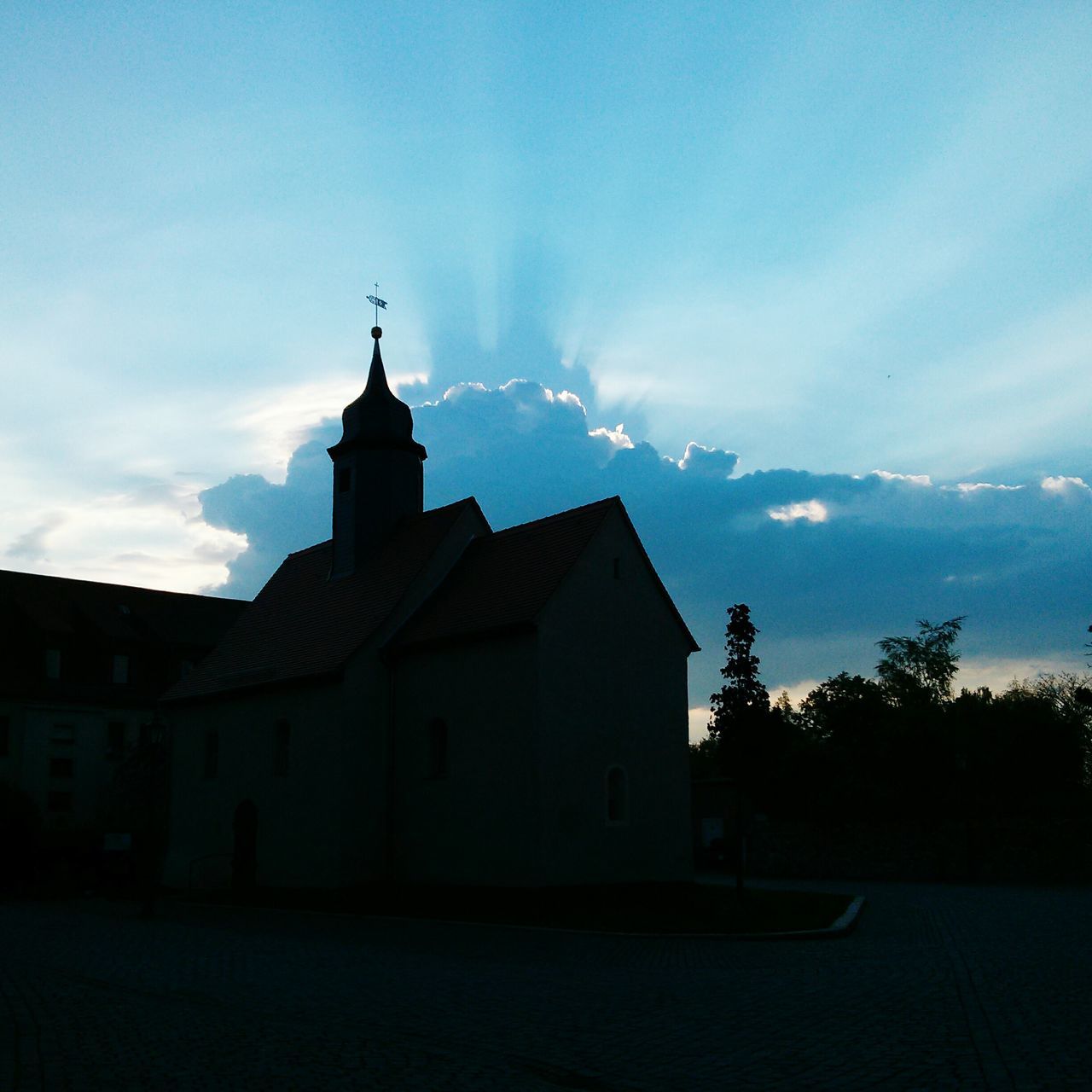 building exterior, architecture, built structure, sky, church, place of worship, religion, spirituality, house, blue, cloud, cloud - sky, cross, outdoors, dusk, no people, tree, residential structure