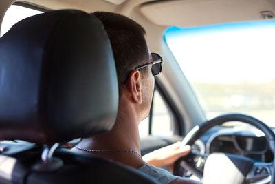 Portrait of man in car