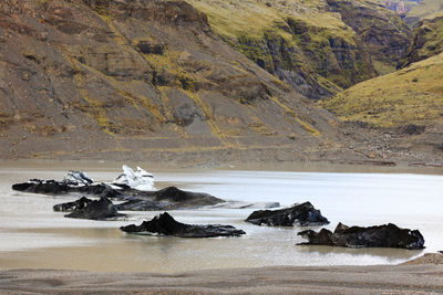 Scenic view of sea and mountains