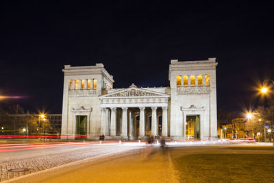 A long exposure motion blurred view of the königsplatz in munich, germany at night.