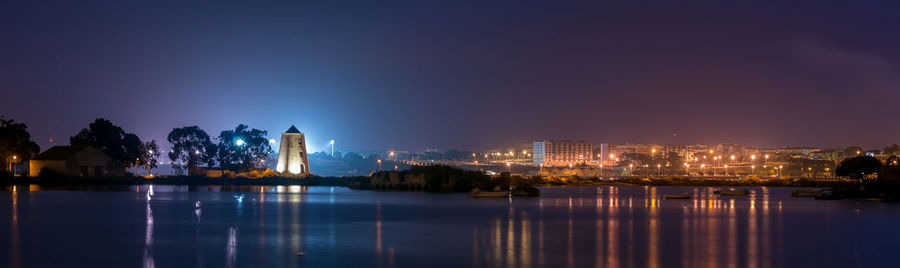 City at waterfront during night