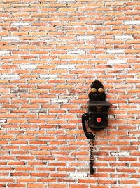 Low angle view of brick wall