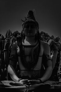 Statue of buddha against clear sky