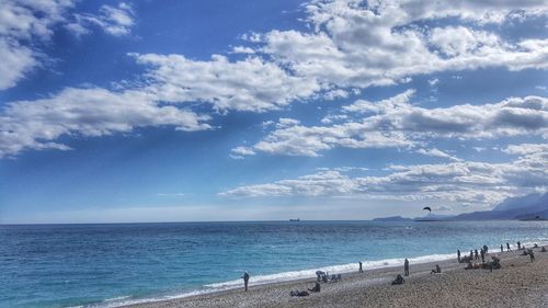 Scenic view of sea against blue sky