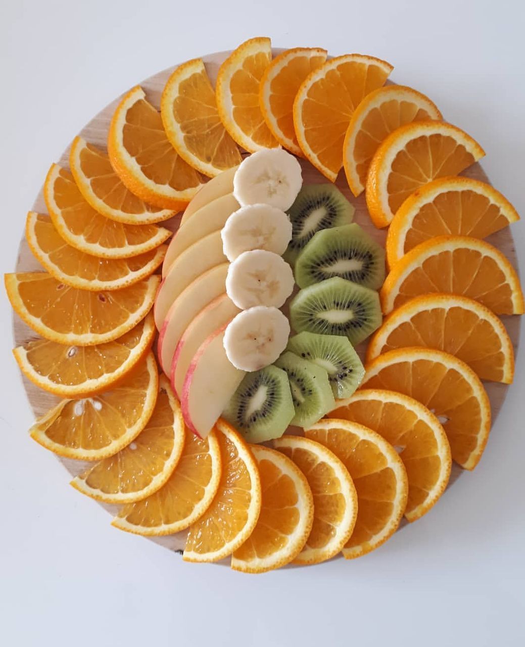 food, food and drink, studio shot, healthy eating, still life, freshness, fruit, white background, citrus fruit, indoors, sweet food, orange, slice, no people, temptation, orange - fruit, sweet, ready-to-eat, orange color, directly above, garnish