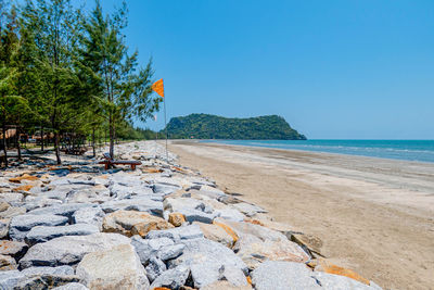 Scenic view of beach against clear sky