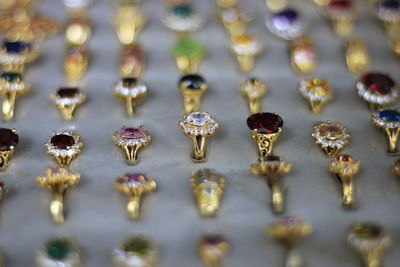 High angle view of jewelry decorations on table