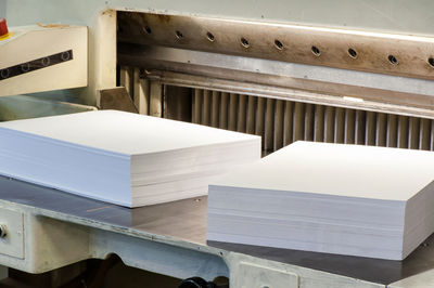 Close-up of blank papers stack on table