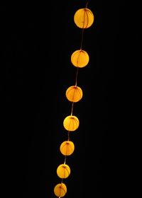 Low angle view of illuminated electric lamp