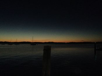 Scenic view of lake at sunset